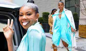Gabrielle Union looks gorgeous as she steps out solo in a turquoise blue dress in NYC