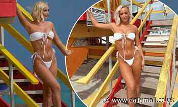 Love Island's Millie Court flaunts her enviable figure in a skimpy white two-piece in Miami