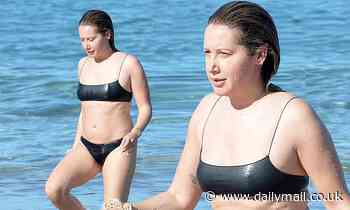 Ashley Tisdale sizzles in cheeky bikini as she splashes in the surf during girls' trip to Maui 