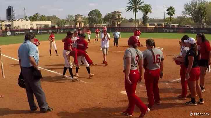 'The right thing to do': College softball players carry injured opponent around bases after grand slam