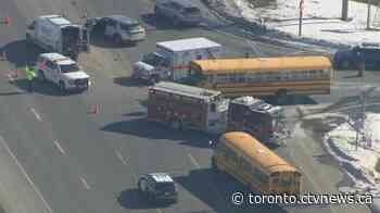 School bus with primary students onboard crashes into van in Whitby