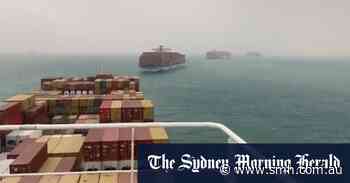 Massive ship jammed in Suez canal