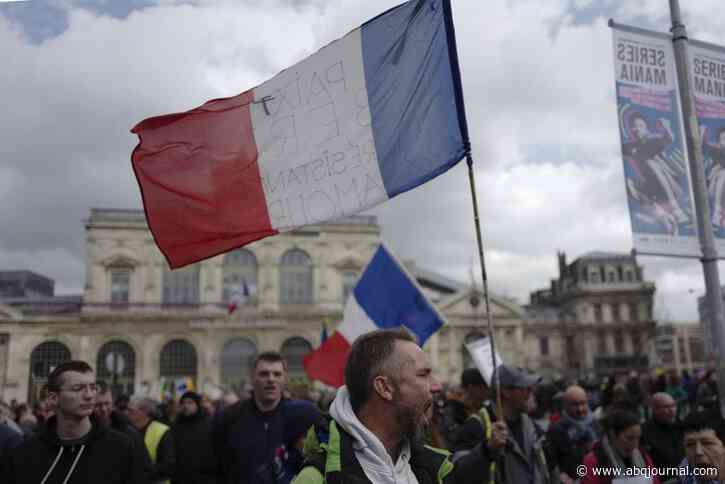 1 million march in France, unions call new pension protests