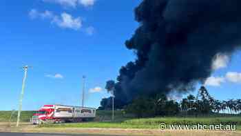 Emergency zone revoked following 'explosive fire' at major Queensland transport depot