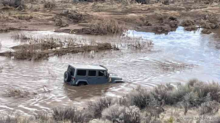 Arizona woman found dead after Jeep swept away by floodwaters