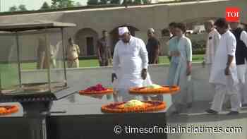 Congress leaders pay tributes at Rajghat after holding day-long protests