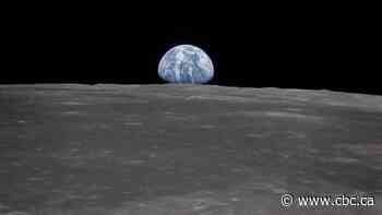 Scientists find water in beads from Chinese moon mission
