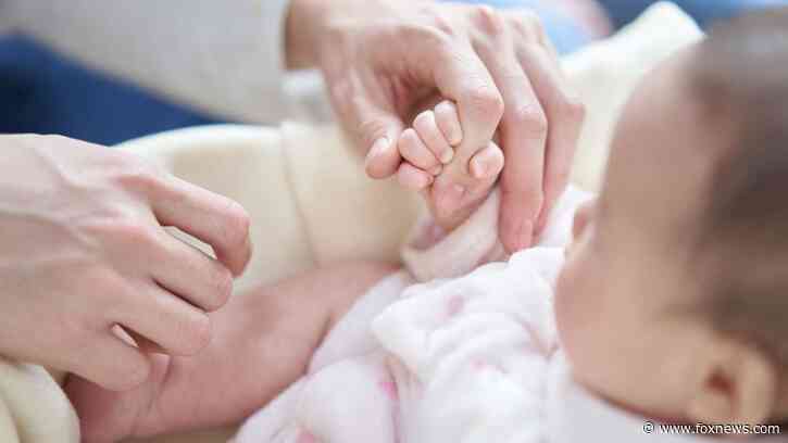 Husband and new dad banned from air travel as wife insists he'd be 'abandoning' their baby