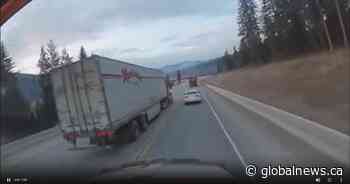 Dangerous, illegal pass by semi on Highway 5 near Clearwater, B.C. caught on video