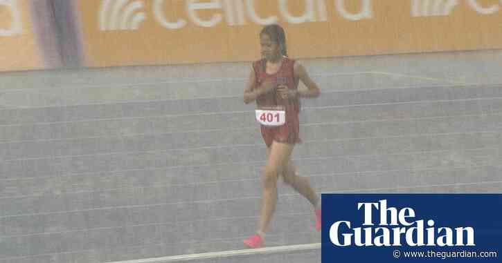 Hitting the squall: Cambodian runner refuses to quit race despite huge storm – video