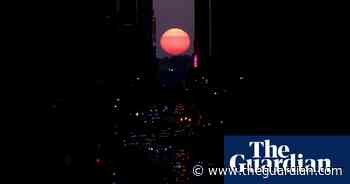 Manhattanhenge sunset lights up New York sky – in pictures