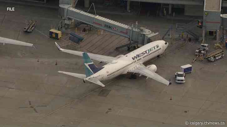 Engine failure, fire force WestJet Encore flight back to Calgary