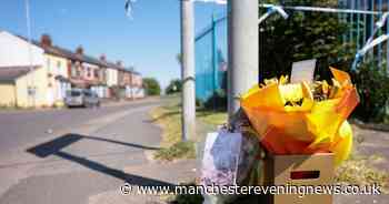 Flowers left at scene of fatal stabbing as detectives continue to quiz murder suspect