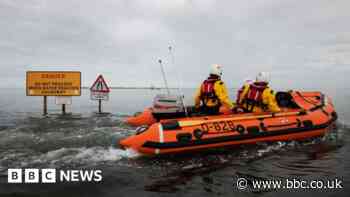 Holy Island rescue after child and adults trapped by tide