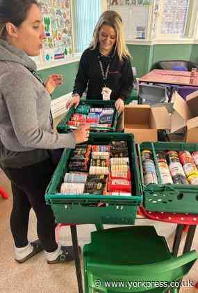 Vita Student staff roll up sleeves to lend a hand to Carecent charity