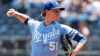 Singer pitches into sixth, Royals beat Rockies 2-0 to avoid sweep
