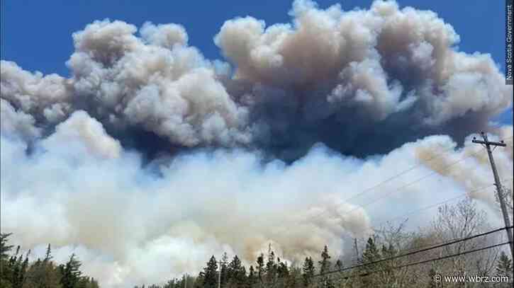 'I can taste the air': Hazardous smoke from wildfires hangs over millions in Canada, US