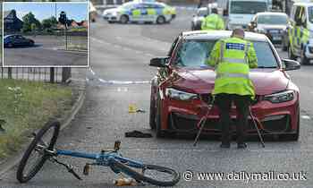Boy, 12, on bicycle dies after being struck down on Birmingham road as BMW driver, 32, arrested