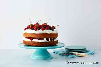 Spelt layer cake with whipped cream and berries