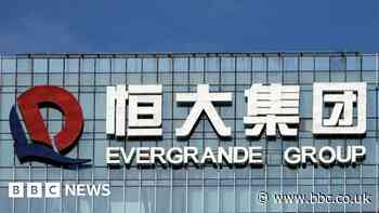 China police detain staff at Evergrande wealth unit