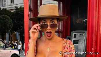 Nicole Scherzinger reveals she's moved to London ahead of starring in West End show Sunset Boulevard as she poses by red telephone box: 'In my UK girl era!'