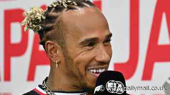 Lewis Hamilton wears a gold tooth grill as fashion loving Formula One ace fields questions ahead of the Japan Grand Prix - after signing £50million extension to keep him at Mercedes
