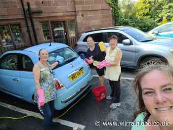 Caldy Manor staff take part in charity car wash for animal rescue