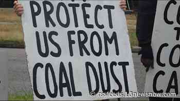 Coal dust concerns in Norfolk lead to protest outside of local railway