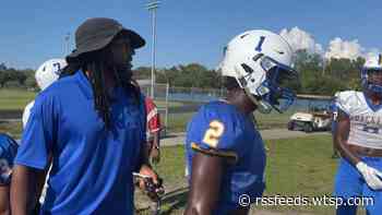 NFL player returns to Largo for 'last childhood dream'