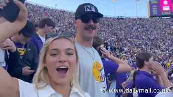 Olivia Dunne holds hands with MLB boyfriend Paul Skenes, while watching LSU's college football win over Auburn