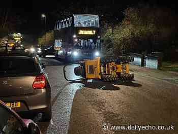 Southampton: Digger ends up on its side in Coxford Road