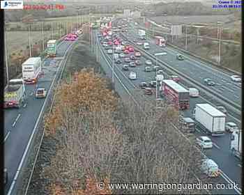 Five mile queues and 25 minute delays on M6 in Warrington