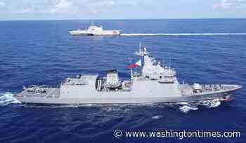 China says a U.S. Navy ship 'illegally intruded' into waters in the South China Sea