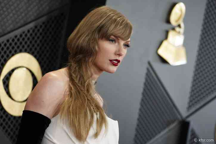 Photographer accuses Taylor Swift's dad of punching him in the face