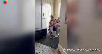 Toddler is thrilled when sister returns from preschool
