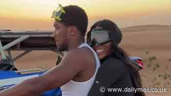 AJ's new sparring partner! Anthony Joshua looks very close to Brit hairstylist as they quad bike across the Dubai desert - after sharing a ringside kiss following his two round demolition of Francis Ngannou