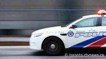 2 arrested after vehicle collides with police car in downtown Toronto