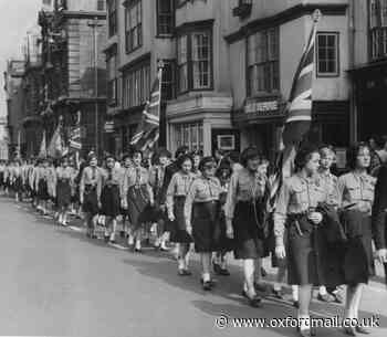 Girl Guides, Brownies and Rangers march through High Street