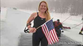 Maine woman sets world record, longest swim under ice