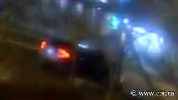 Police look for driver who put person in car after hit and run