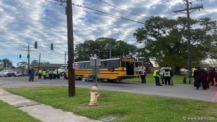 Three students, one emergency employee suffer minor injuries after school bus crash involving ambulance