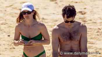 Mark Ronson and bikini-clad wife Grace Gummer frolic on the beach while enjoying a family vacation with their daughter Ruthie, one, in Mexico