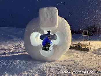 Sculptor Martin Sharp, from York, creates giant snow embryo