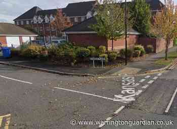 Crews tackle fire involving two vehicles and a garage in Warrington