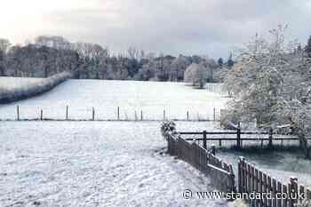 Snow falls in south-west England and Wales ahead of wet and windy weather