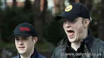 Jedward cut relaxed figures in matching baseball caps on stroll in North London after their bitter war of words with former mentor Louis Walsh