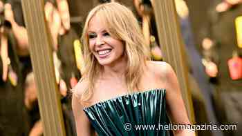 Kylie Minogue shows off ultra-toned legs in daring dress