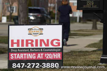Applications for US unemployment benefits dip to 210K
