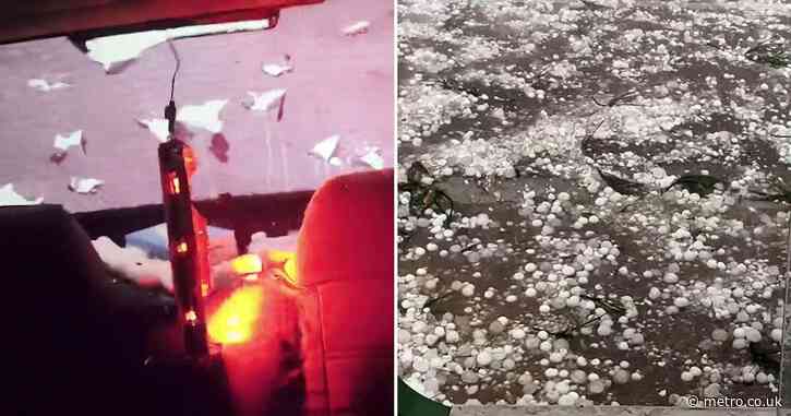 Egg-sized hailstones smash car windows during heavy storm