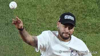 Neymar throws the first pitch at Miami Marlins MLB season opener - the day after partying with David Beckham - as the Brazil star tries out a new sport amid ongoing ACL recovery